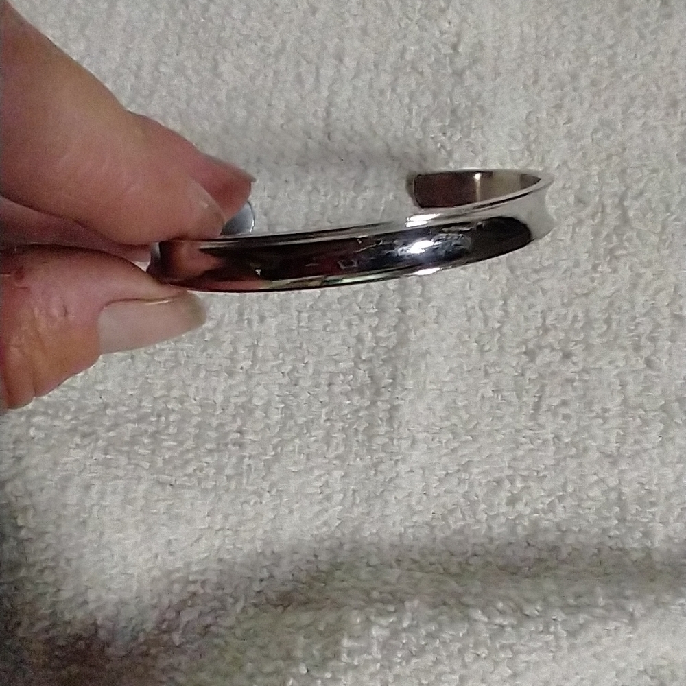Silvertone my story isn't over yet cuff bracelet